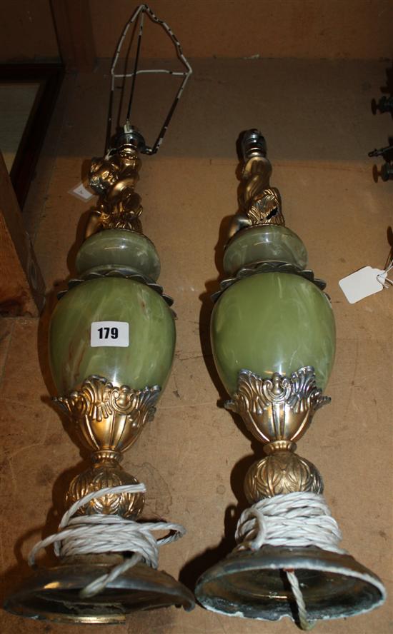 Pair of onyx cherub lamps